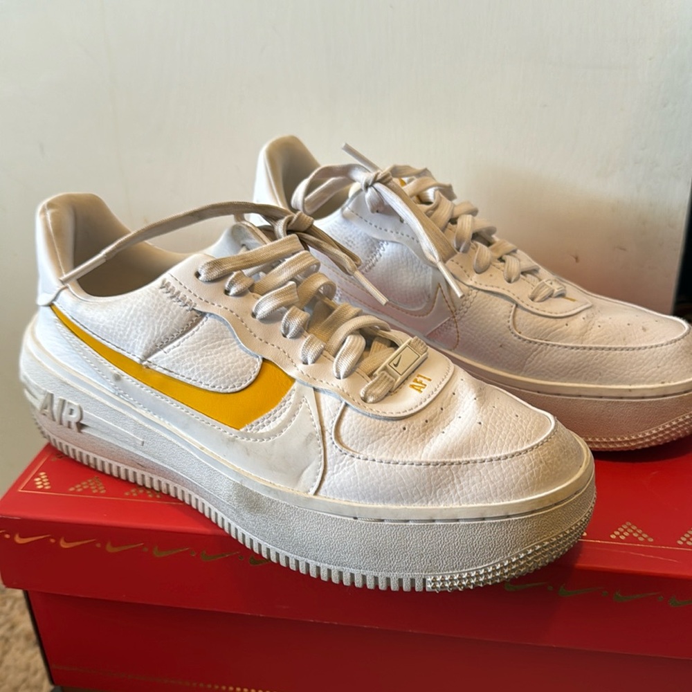 Yellow Nike swoosh Air Force ones